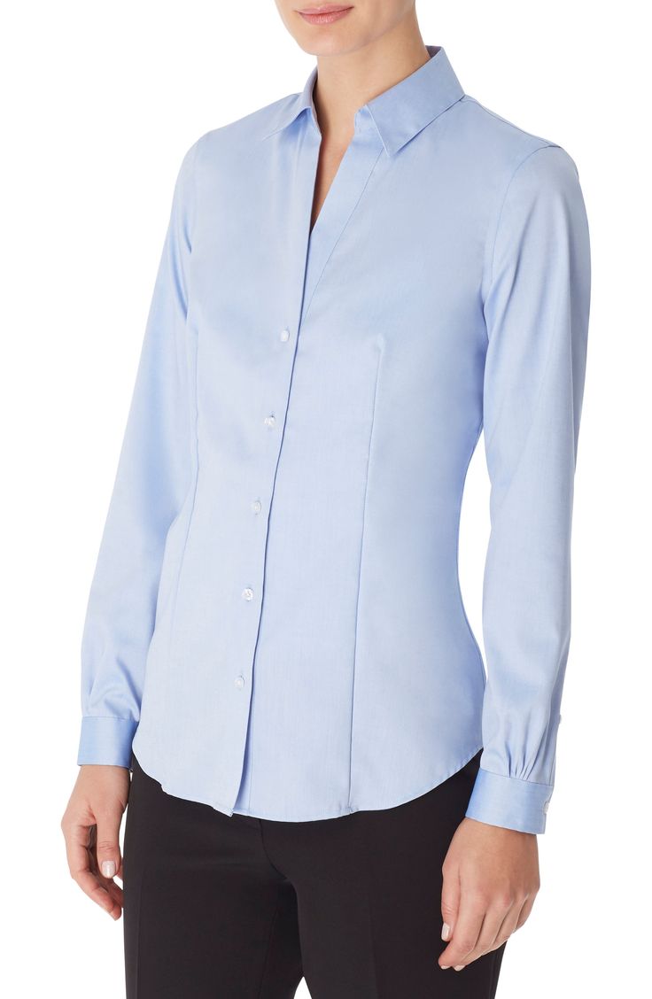 This classic button-up shirt with figure-defining darts is cut from cotton for comfort. 27" length Front button closure Spread collar Long sleeves with button cuffs Curved hem 100% cotton Dry clean or hand wash, line dry Imported Women's Clothing Button Up Shirts Women, Ladies Shirt, Blouse Online, Button Front Shirt, Dillard's, Jones New York, Clothing Company, Blue Blouse, Neck Shirt