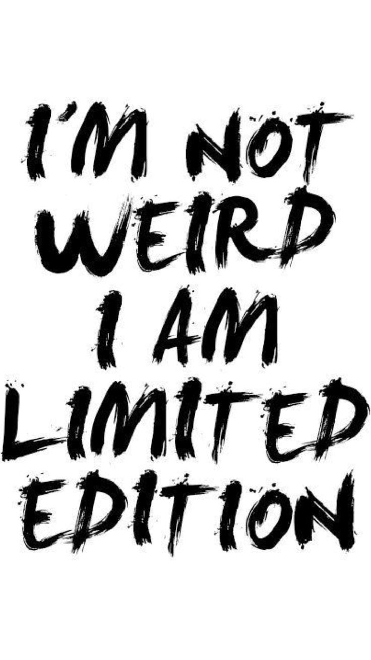 the words i'm not weird i am limited edition are painted on white paper