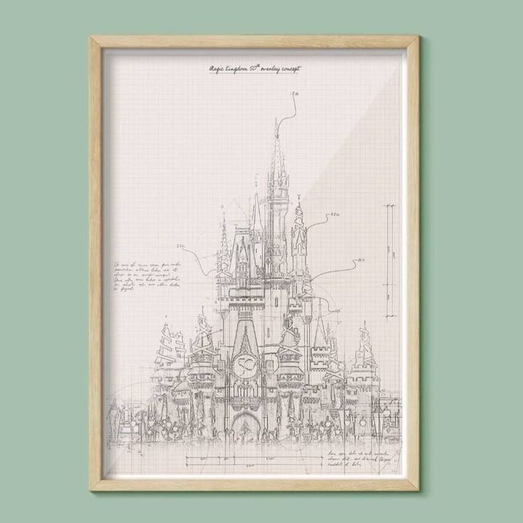 a drawing of the disney castle in front of a green wall with a wooden frame