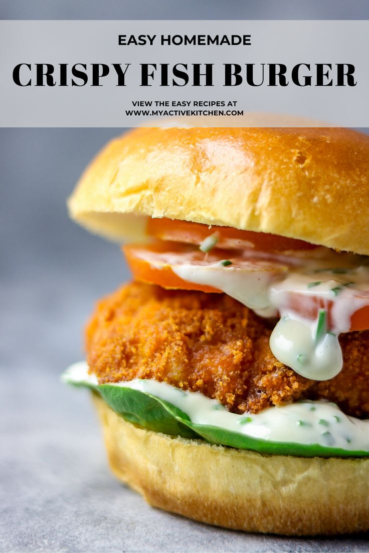 crispy fish burger with ranch dressing and mayonnaise on the side, sitting on a bun