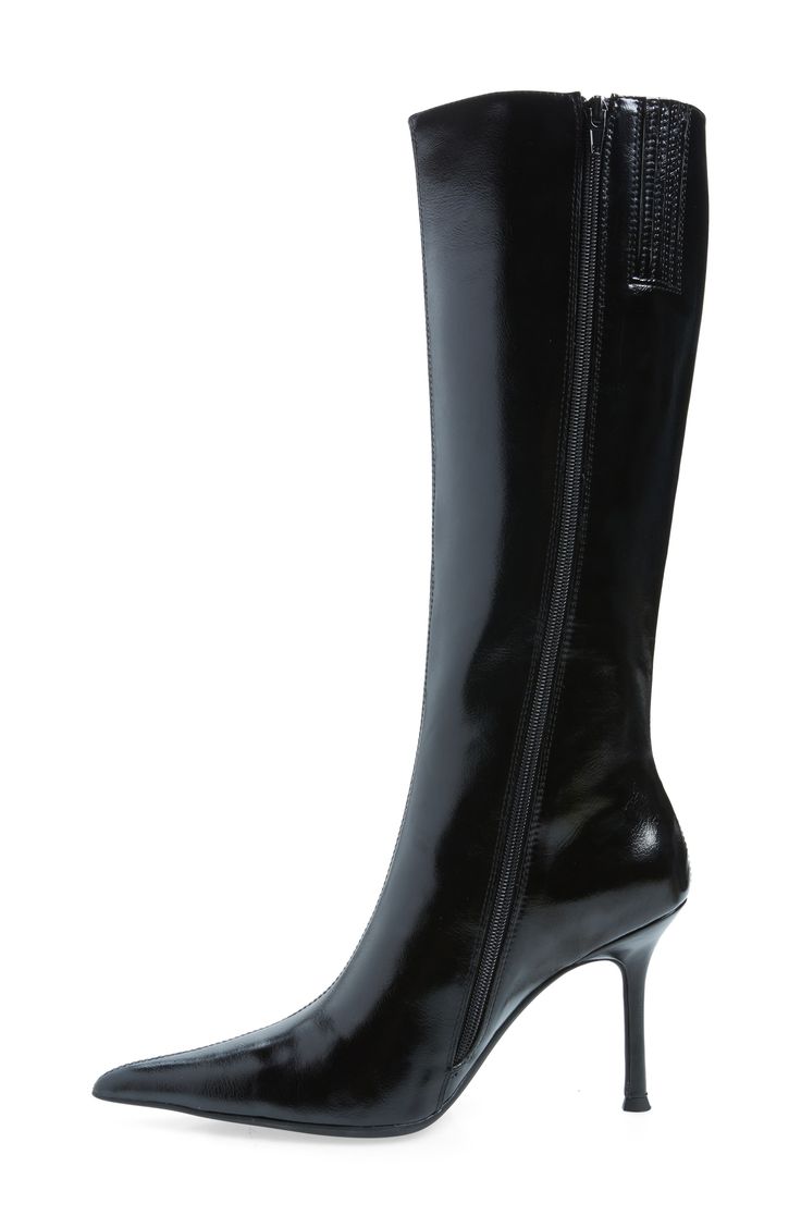 A smooth upper and pointy toe add contemporary allure to a striking boot elevated by a slender, stacked heel. 3 3/4" heel 13 1/2" shaft; 12" calf circumference. Narrow calf Side zip closure with elastic gore inset Synthetic upper/leather and textile lining/synthetic sole Imported Formal Mid-calf Boots With Wide Calf And High Shaft, Pointed Toe High Boots For Night Out, Sleek Wide Calf Heeled Boots With High Shaft, Sleek High Ankle Boots With 4-inch Heel, Sleek Formal Platform Boots Medium Width, Elegant Evening High Ankle Platform Boots, Sleek Formal Mid-calf Boots, Elegant Platform Boots With Wide Calf And High Heel, Elegant High Heel Platform Boots With Wide Calf