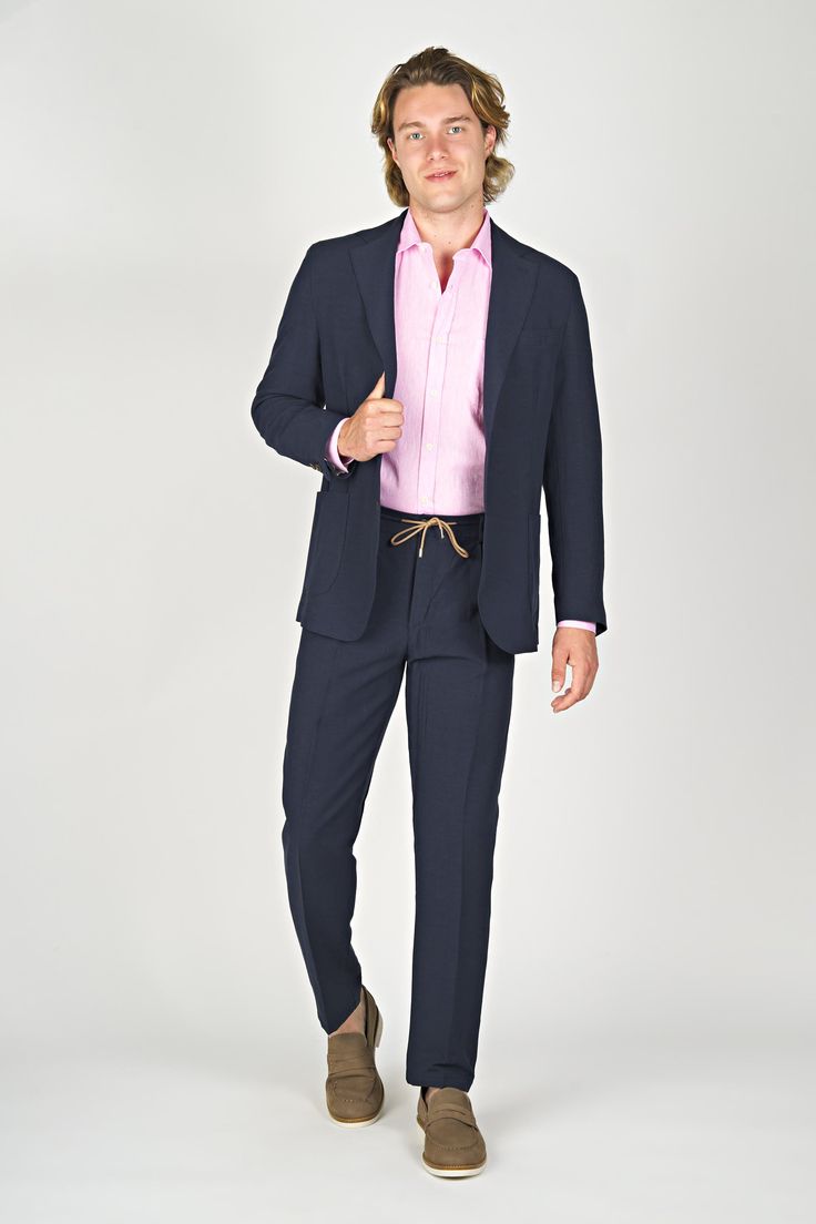 Expertly crafted with a blend of cotton and linen, this unlined jacket features a two-button closure and notched lapels for a classic and sophisticated look. Experience the comfort and breathability of natural fibers, making it the perfect choice for any occasion. Business Casual Linen Blazer With Patch Pockets, Linen Tweed Jacket With Patch Pockets For Work, Linen Blazer With Patch Pockets For Business Casual, Linen Blazer With Concealed Placket And Long Sleeves, Long Sleeve Linen Blazer With Concealed Placket, Tailored Linen Blazer With Patch Pockets, Unstructured Notch Lapel Sport Coat For Formal Occasions, Linen Blazer With Notch Lapel And Welt Pockets, Linen Blazer With Concealed Placket