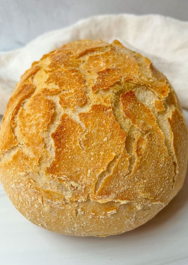 a loaf of bread sitting on top of a white plate