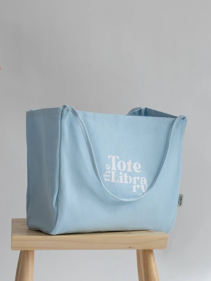 【Product description】 Introducing our newest addition to The Tote Library family - a stylish and practical tote bag that combines elegance with comfort and ease. 【Material】 Made from thickened 16A canvas, this bag is durable and able to withstand the weight of your daily essentials. The "Tote Library" logo adds a touch of sophistication, while the simple and versatile design makes it perfect for any occasion. 【Functional】 With a large capacity, this lazy style tote is perfect for carrying all of Library Logo, Unique Tote Bag, Lazy Style, Carryall Tote, Travel Items, Fashion Wishlist, Daily Essentials, Coconut Milk, Canvas Tote