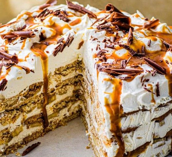 a cake that has been cut into pieces and is sitting on a white platter