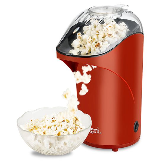 a red and white popcorn maker with bowl of popcorn next to it on a white background