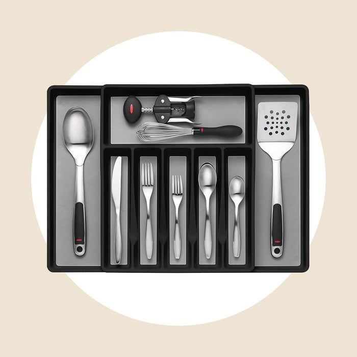 an assortment of kitchen utensils in a box