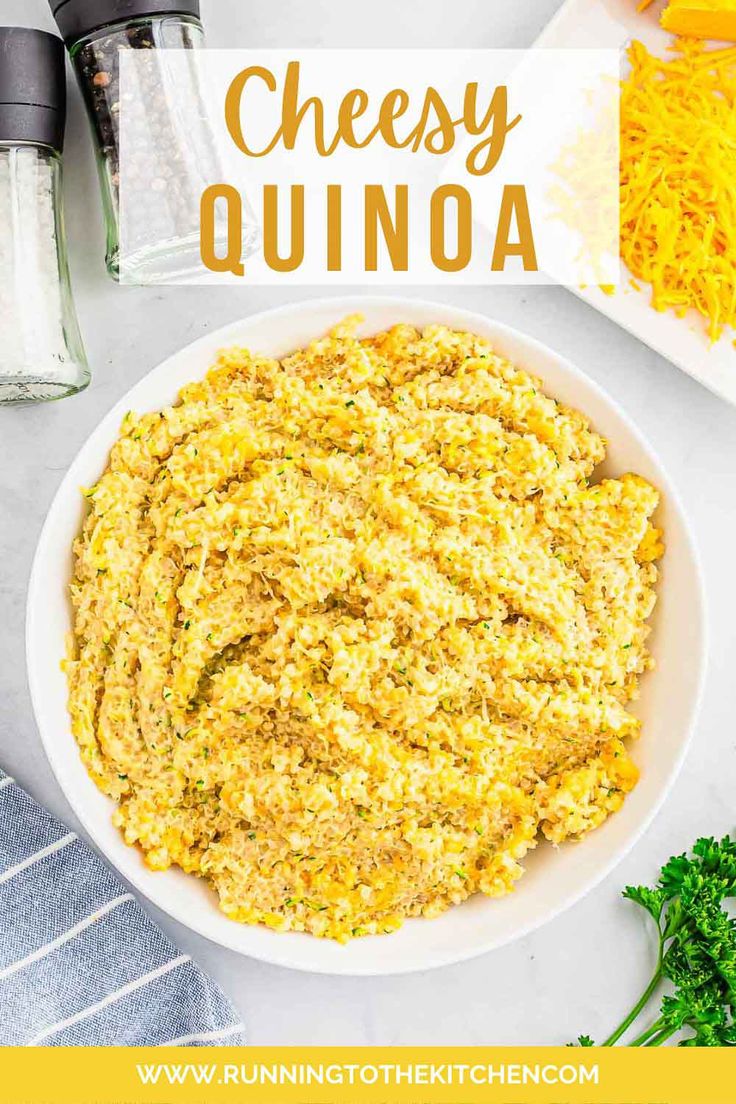 cheese quinoa in a white bowl with parmesan cheese on the side