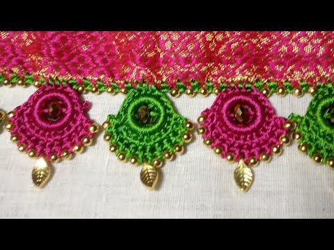 three pieces of beaded fabric with bells and beads on them, all in different colors