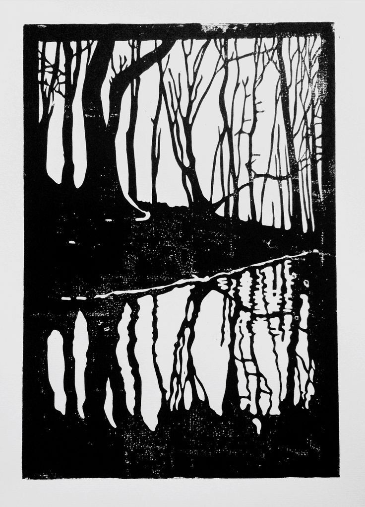 a black and white drawing of trees reflected in water