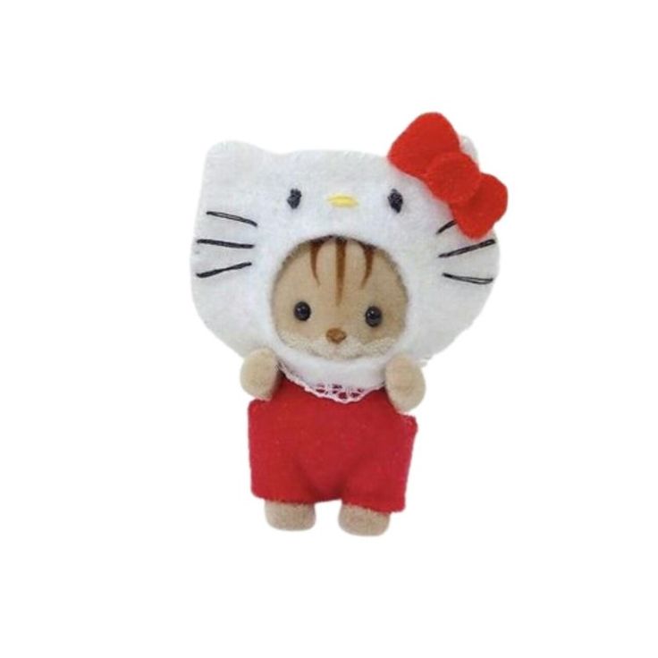 a stuffed animal with a red bow on it's head and a hello kitty outfit