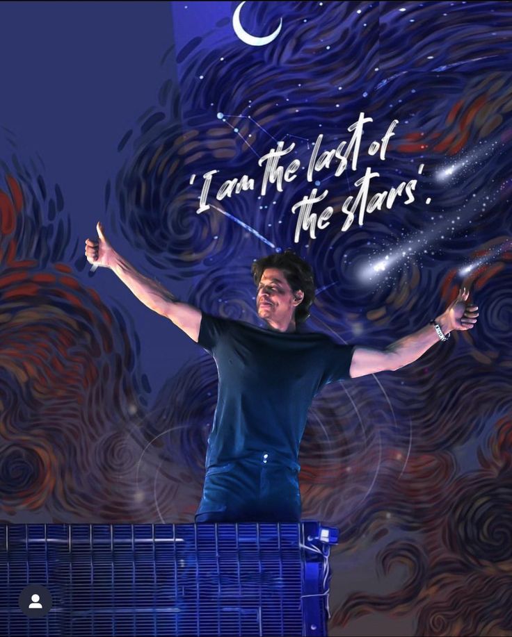 a man standing on top of a blue box in front of a sky with stars