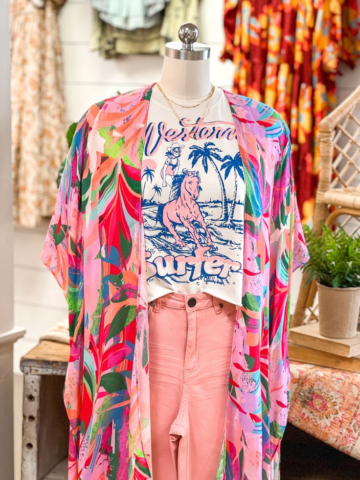 Spring is almost here! Features a gorgeous floral and botanical print, one size, and easy to dress up or dress down. Made of 100% viscose. Bow Tie Blouse, Floral Kimono, Tie Blouse, Botanical Print, Cut Off Shorts, Crop Tee, Dressed Down, Botanical Prints, Neck Tie