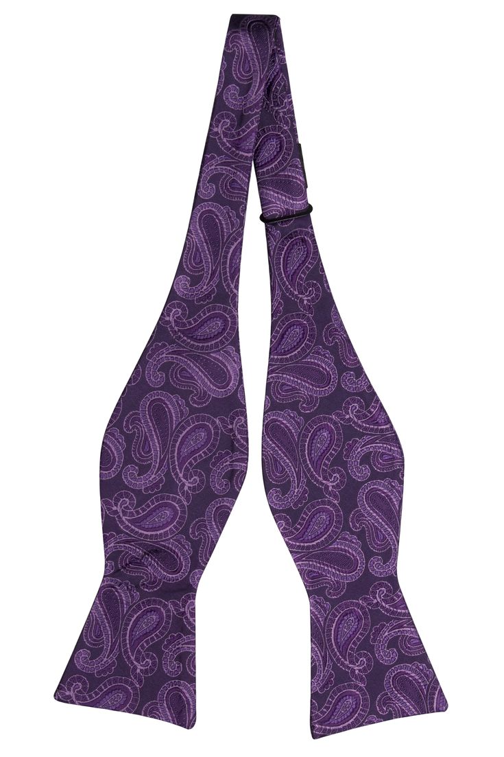 Accessorise with Swingpjatt and your dance card will soon be full. Our silk bow tie waltzes onto the scene in purple paisley, a vibrant combination of colour and pattern with serious pizazz. You can't put a foot wrong if you wear it with a white shirt! Fitted Pre-tied Tie For Party, Purple Bow Tie For Party, Purple Party Bow Tie, Fitted Pre-tied Party Tie, Lilac Shirt, Boys Ties, Silk Bow Ties, Purple Paisley, Boys Bow Ties