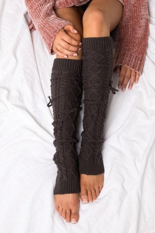 Long cable knit tie leg warmers. These yummy, thick-knitted leg warmers are perfect for everything from lounging by the fire on a cozy afternoon to running errands tucked into your new boots. DETAILS: Cable Knit Pattern One Size fits most Removable Ties Leg Warmer Measures Approximately 25" Cozy Afternoon, Knitted Leg Warmers, 2000s Fashion Trends, Denim Short Dresses, New Boots, Leg Warmer, Knit Tie, Romper Outfit, Knit Pattern