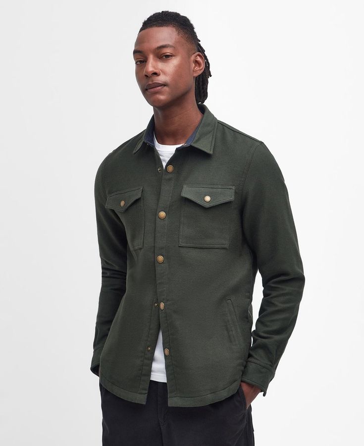 The Barbour Carrbridge overshirt presents classic style for men. It’s crafted from 100% cotton and features snap buttons through the front. Shaped to a tailored fit, it’s a refined style that works well with denim and boots. Classic Workwear Flannel Shirt With Snap Buttons, Classic Flannel Shirt With Snap Buttons For Work, Classic Fall Shirt With Buttoned Pockets, Classic Cotton Flannel Shirt With Snap Buttons, Classic Collared Utility Jacket With Snap Buttons, Classic Collared Shacket With Button Closure, Classic Button-up Flannel Shirt With Snap Buttons, Rugged Fall Workwear Shirt, Classic Fall Shirt With Flap Pockets