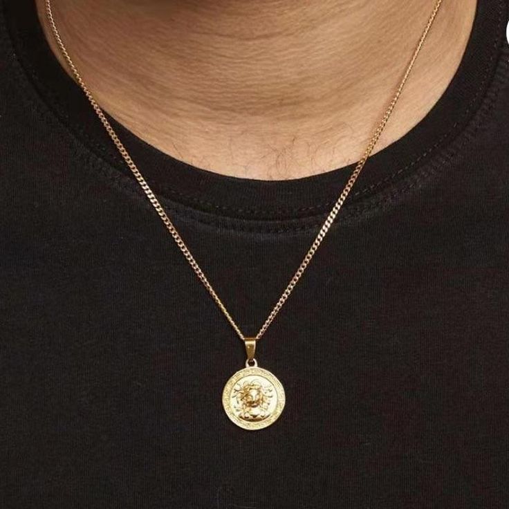 Medusa comes from Greek mythology and this symbol is said to provide protection against negative energies. This perfectly crafted pendant looks great by itself and works amazingly well when paired with other pendants. Material: 18k Gold Plated Premium 316L Stainless Steel Chain Length: 22" -Never fading-Nickel-free-Durable and anti-tarnish-Excellent touch feeling-No allergies-No deformation-Everlasting Shine Spiritual Medallion Necklace Tarnish Resistant, Symbolic Pendant Medallion Necklace, Tarnish Resistant, Symbolic Medallion Pendant Necklace, Tarnish Resistant, Spiritual Gold-plated Medallion Pendant Necklace, Symbolic Gold Plated Medallion Pendant Necklace, Spiritual Gold Plated Medallion Necklace, Spiritual Gold Plated Round Medallion Necklace, Spiritual Gold-plated Medallion Necklace With Round Pendant, Medusa Pendant