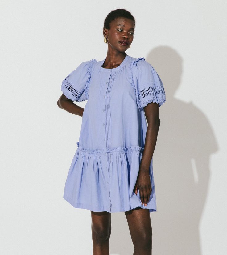 Shop Dolly Mini Dress | Cleobella Spring Cotton Puff Sleeve Dress With Elastic Sleeves, Billowy Cotton Puff Sleeve Dress For Daywear, Cotton Puff Sleeve Dress With Elastic Sleeves For Spring, Knee-length Ruffled Dresses With Relaxed Fit, Knee-length Dresses With Ruffles And Relaxed Fit, Relaxed Fit Knee-length Dresses With Ruffles, Relaxed Fit Knee-length Ruffled Dresses, Spring Cotton Voile Day Dress, Spring Cotton Puff Sleeve Dress With Pleated Sleeves