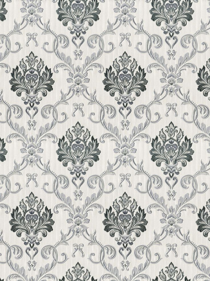 an ornate wallpaper pattern in grey and white