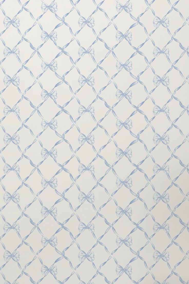 a white and blue wallpaper with an abstract design