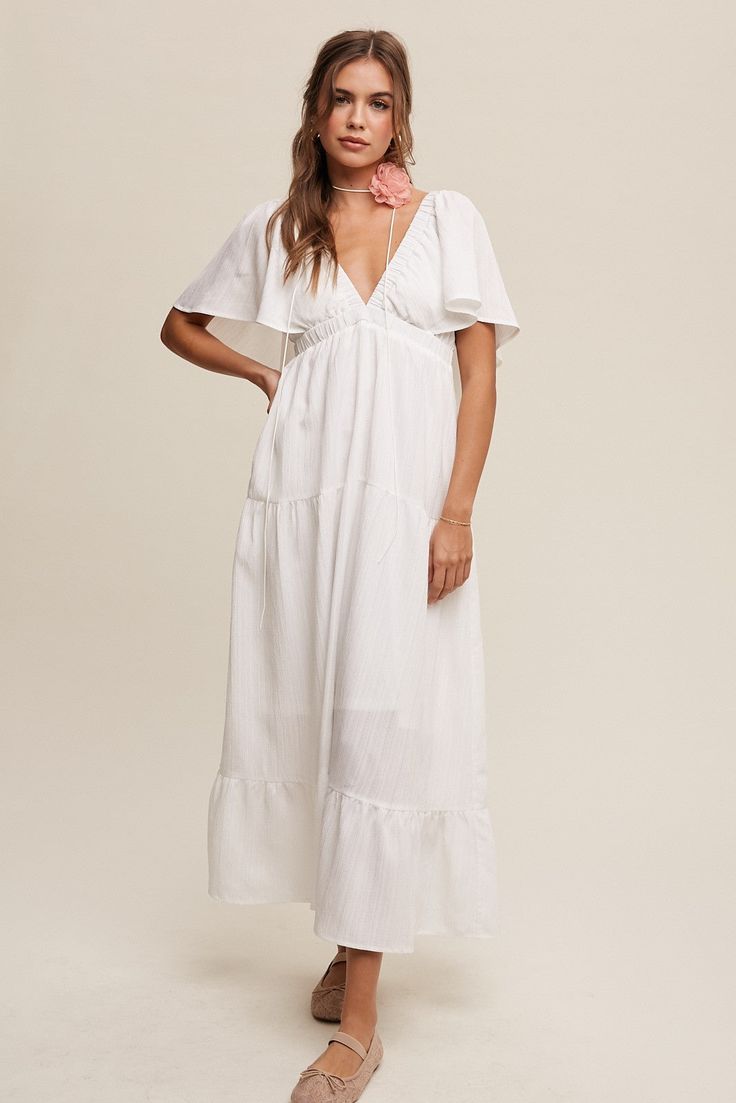 - V-neck ruffle sleeve flowy maxi dress - V-neck with elastic - Adjustable tie string on back - Tiered skirt - Hidden side seam pockets - Finished with clean hem - Lined Vacation Dress, Flowy Maxi Dress, Tiered Midi Dress, Sleeve Maxi Dress, Flutter Sleeve Dress, Glam Dresses, Vacation Dresses, Tier Skirt, Neck Ruffle