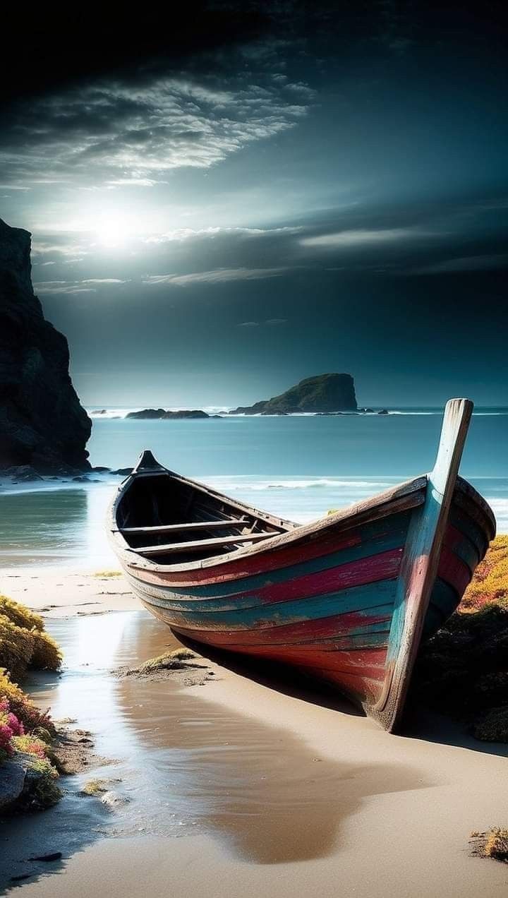 a boat sitting on top of a sandy beach next to the ocean under a cloudy sky