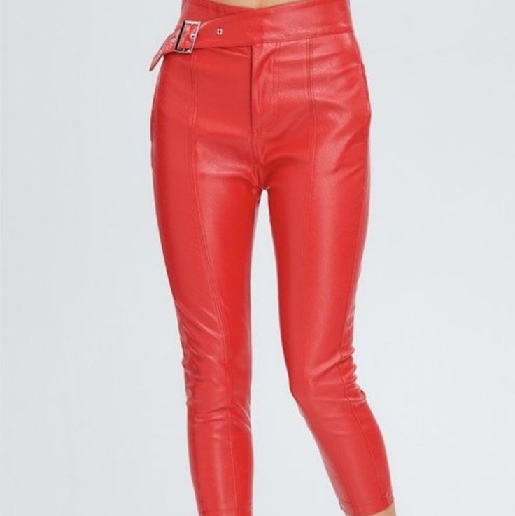 Ruby Red Faux Leather Pants With Front Buckle Chic Red Bottoms With Belt Loops, High Waist Faux Leather Bottoms With Belt Loops, Chic Red Pants With Belt Loops, Trendy Red Pants With Belt Loops, Red Pants For Night Out In Fall, High Waist Red Pants For Fall, High Rise Faux Leather Pants For Spring, Fitted Red Bottoms With Belt Loops, Chic Red Pants For Fall