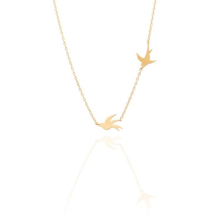 This uniquely designed gold vermeil necklace celebrates the freedom of new beginnings Material: Gold Vermeil: 925 Sterling Silver Plated with 18K Solid Gold with a thickness of minimum 2,5 microns with no other metal between them.Avoid contact with water or any other liquids. This item is delicate, keep it in the provided pouch when not wearing it.IS Jewellery is manufactured in Portugal using only pure silver, 18K gold and real stones, meeting all the quality requirements set by the Responsible Gold Necklace With Bird Design As Gift, Albatross Necklace, Gold Swallow Necklace, Yellow Gold Bird Design Pendant Jewelry, Silver Bird Necklace, Symbols Of Freedom, Real Stone, Sustainable Jewelry, Metal Necklaces