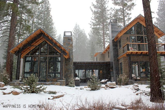 a couple of houses that are in the snow