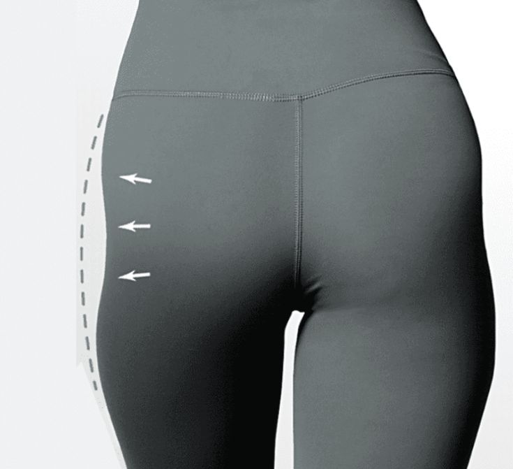 the bottom of a woman's leggings with arrows on it