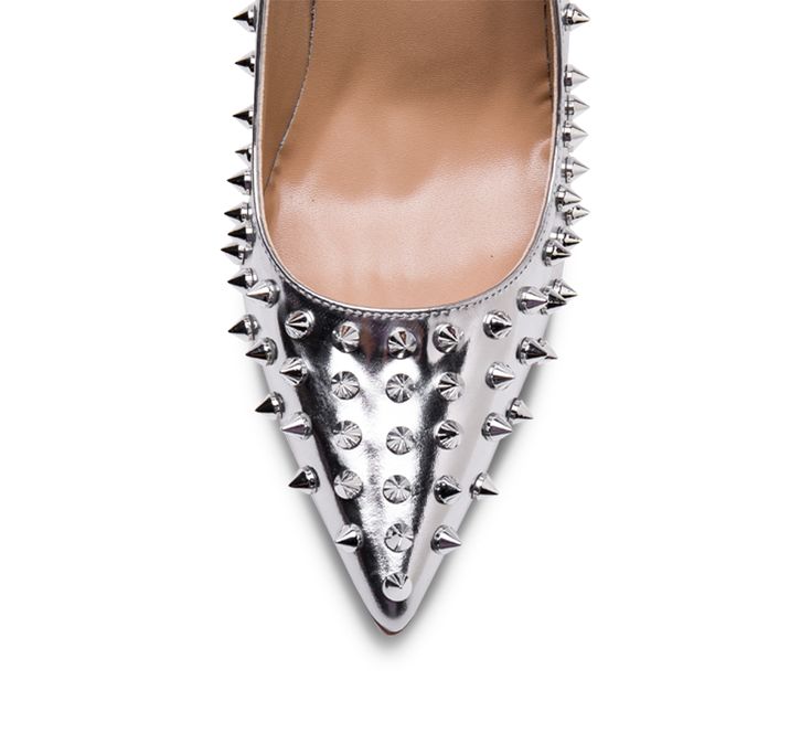 Genuine leather upper and insole; rubber outsole Point toe Spikes all over the shoes Pink sole 4" heel (10 cm, approximately) Party Heels With Rubber Sole, Silver Pointed Toe Heels With Studs, Party Heels With Rubber Sole And Closed Toe, Party Heels With Rubber Sole, Closed Toe, Closed Toe Party Heels With Rubber Sole, Closed Toe Heels With Rubber Sole For Party, Silver Heels With Round Toe, Silver Heels With Spikes For Formal Occasions, Silver Spiked Heels For Formal Occasions