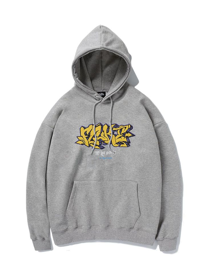 a grey hoodie with graffiti on it