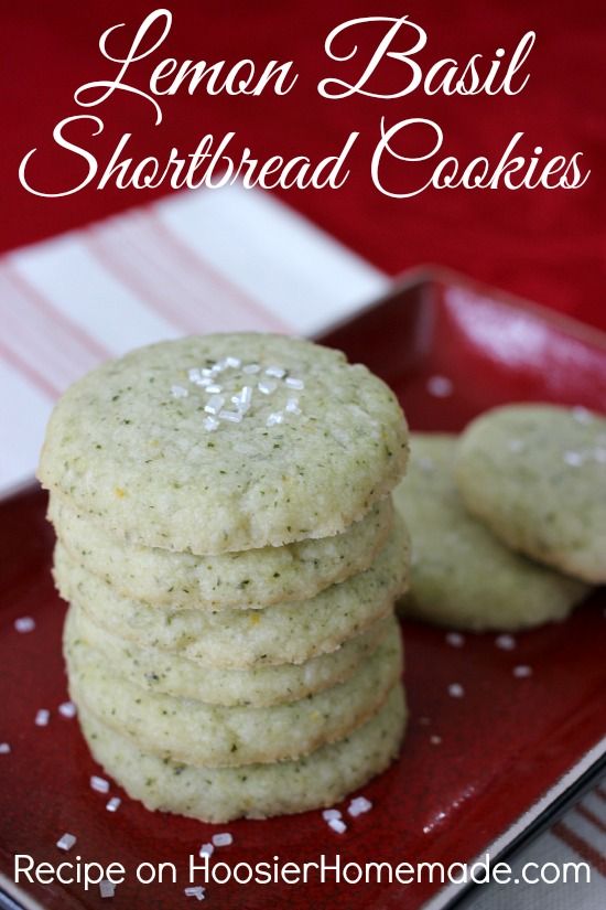 lemon basil shortbread cookies on a red plate