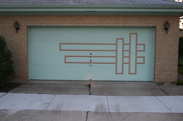 a blue garage door with lines painted on it