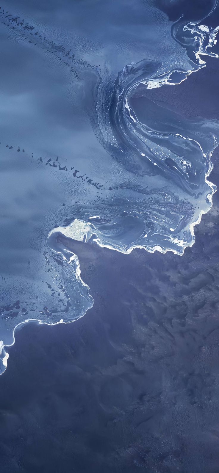 an aerial view of the ocean from space