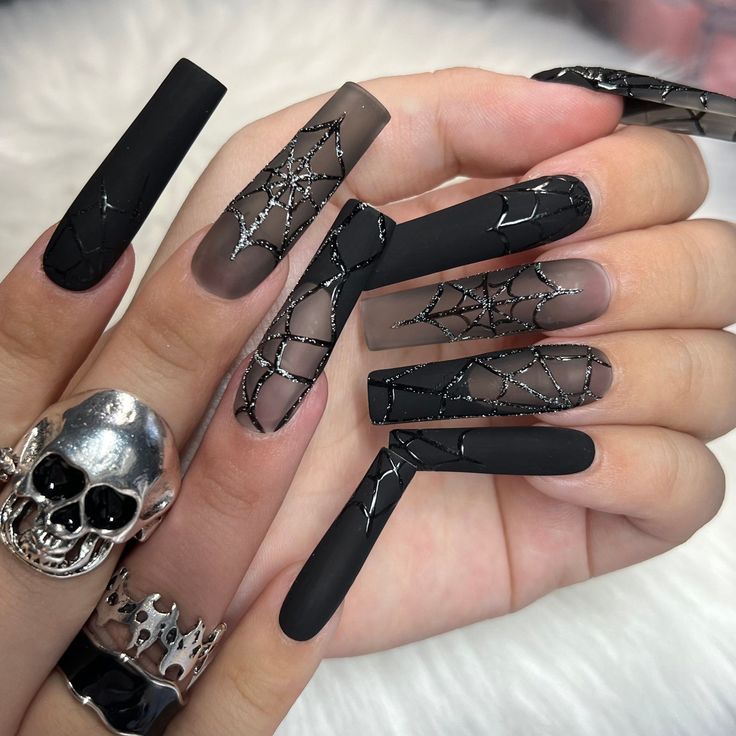 "Transform your nails into works of art with these #HalloweenNailDesigns that are sure to impress. Whether you're going for a classic black and orange look or something more unique, these #HalloweenNailIdeas have got you covered. 🕷️🕸️ #NailsofInstagram #HalloweenBeauty #NailAddict #HalloweenNailArt #HalloweenNailGoals #HalloweenNailInspo #NailEnvy #HalloweenNailGame #NailSwag #HalloweenNailGoals Ongles Goth, Black Halloween Nails, Nail Art Halloween, Halloween Acrylic Nails, Cute Halloween Nails, Black Acrylic Nails, Punk Nails, Acrylic Press On Nails, Grunge Nails