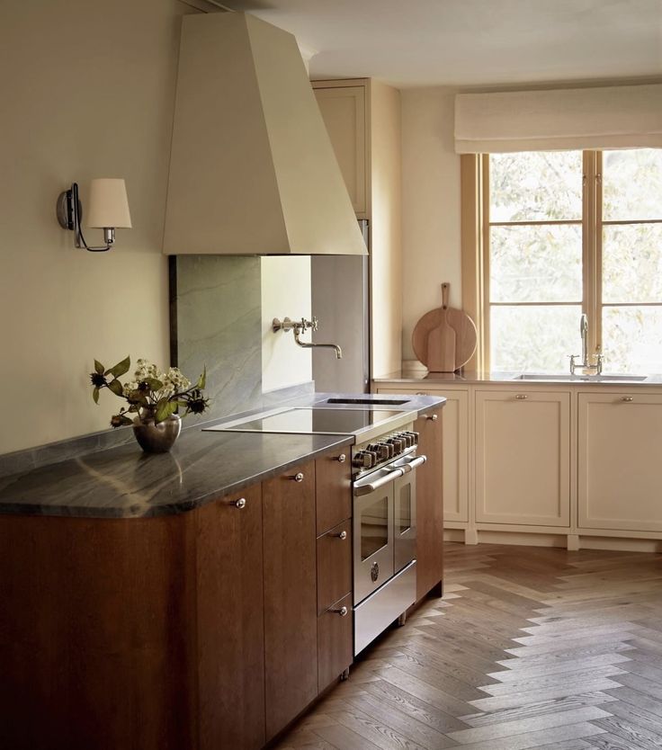 a kitchen with an oven, stove and counter top in it's center island