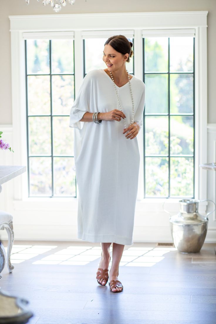 Indulge in luxury with the Comfy Kenzie Kaftan! This kaftan offers ultimate comfort and style. Perfect for all occasions, formal or informal, or even just lounging. With convenient pockets, it's perfect for going out or cozy nights in. Made from a soft wool blend that is 70% Merino wool and 30% acrylic. Click Here for Care Instructions Elegant Oversized V-neck Maxi Dress, Elegant Relaxed Fit Dress For Loungewear, Elegant V-neck Kaftan For Vacation, Elegant Relaxed Fit Maxi Dress For Vacation, Elegant Oversized Dresses For Vacation, Elegant Oversized Spring Kaftan, Elegant Relaxed Fit Dress For Vacation, Chic Tunic Maxi Dress For Loungewear, Elegant Summer Loungewear Maxi Dress