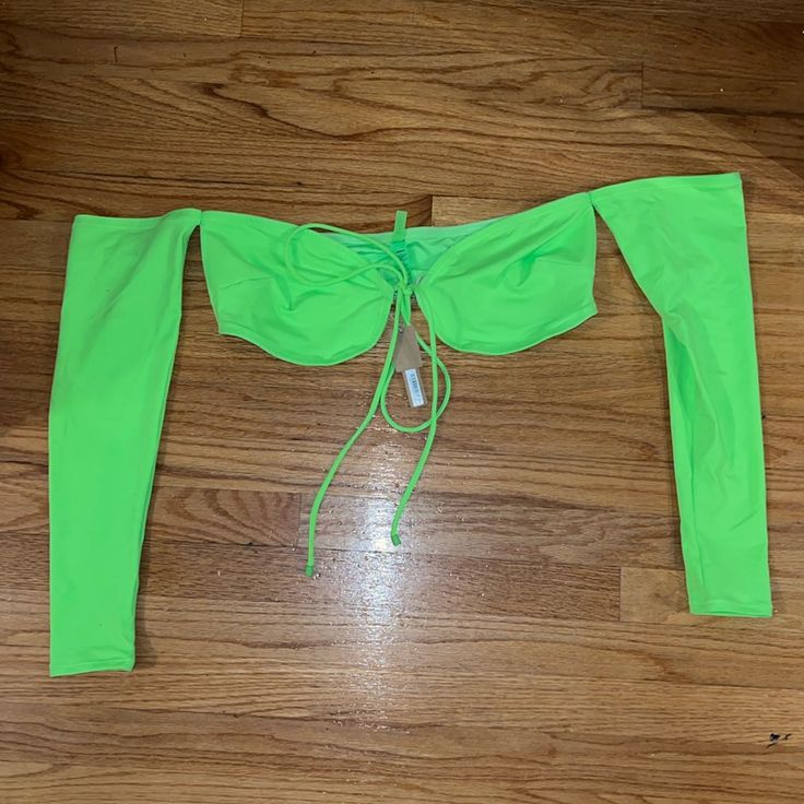 Questions? Leave A Comment Below! Long Sleeve Tops For Pool And Spring, Fitted Long Sleeve Green Swimwear, Fitted Green Tops For Poolside, Stretch Tops For Pool In Solid Color, Stretch Top For Pool, Fitted Beachwear Tops For Poolside, Stretch Drawstring Tops For Beach, Solid Swimwear For Club In Spring, Long Sleeve Club Swimwear For Summer