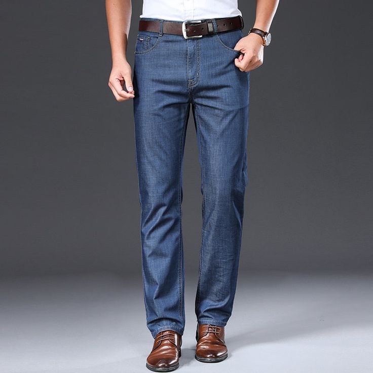 Elegant Straight Leg Jeans With Pockets, Spring Straight Fit Denim Blue Pants, Slim Fit Straight Leg Jeans For Spring, Spring Slim Fit Straight Leg Jeans, Elegant Relaxed Fit Jeans With Pockets, Classic Non-stretch Straight Leg Jeans, Tailored Jeans With Pockets For Business Casual, Fitted Jeans With Pockets For Business Casual, Slim Fit Jeans With Welt Pockets