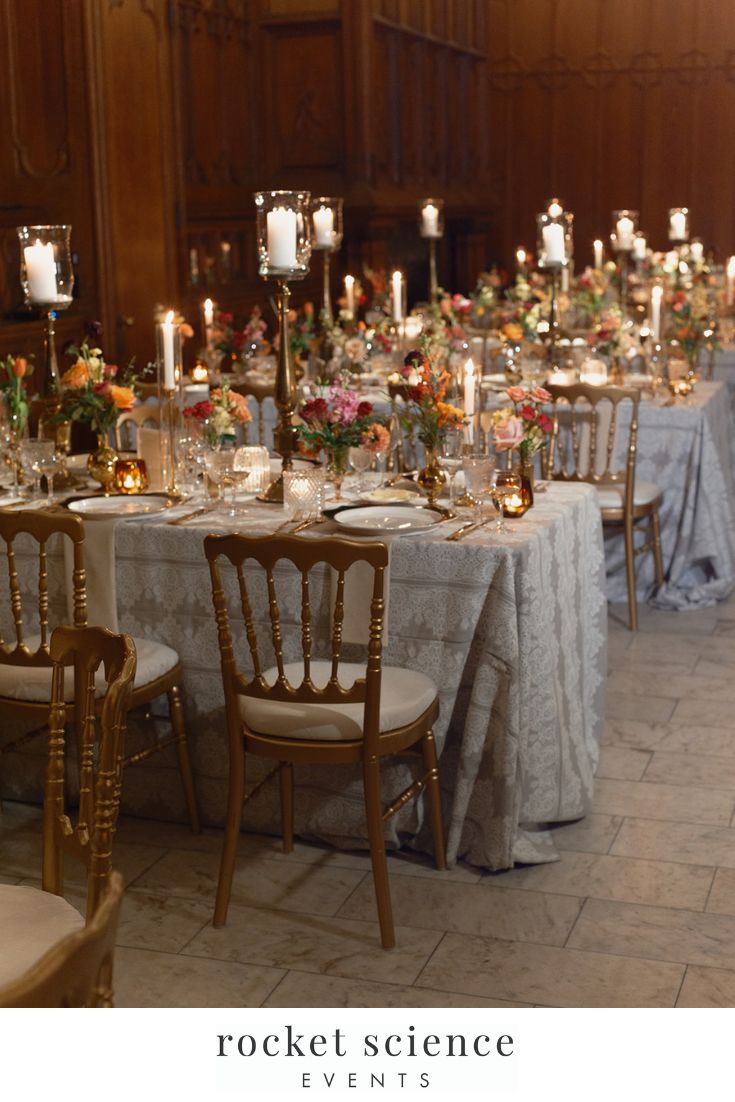 the tables are set with candles and centerpieces for an elegant wedding reception at rockefeller science