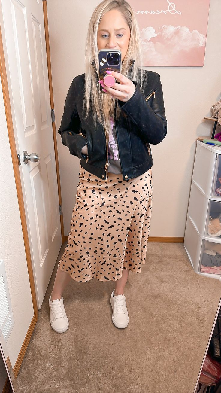 Satin Leopard Print Midi Skirt w/ elastic waistband Chic skirt perfect for spring - great with tennis shoes or boots! Perfect To dress up or down. Model is in size Medium - 28 waist - runs a little small Trendy Long Skirt For Fall, Black Casual Skirt For Fall, Casual Black Skirt For Fall, Trendy Non-stretch Skirt For Spring, Casual Midi Skirt For Fall, Casual Fall Midi Skirt, Casual Non-stretch Skirt For Spring, Casual Long Skirt For Spring, Casual Lined Skirt For Spring