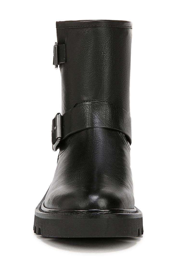 Decorative buckle straps and a treaded lug sole give a moto-inspired kick to this leather bootie. 1 1/4" heel 6" shaft Pull-on style Leather upper/synthetic lining and sole Imported Ankle-high Moto Boots With Buckle For Work, Ankle-high Moto Boots With Buckle Closure For Workwear, Leather Moto Boots With Buckle For Work, Black Moto Boots With Buckle For Work, Black Moto Boots With Buckle Closure For Work, High Ankle Leather Platform Boots With Buckle, Ankle-high Moto Boots With Lug Sole For Work, Moto Boots With Lug Sole And High Ankle, Moto Boots With Buckle Closure For Workwear