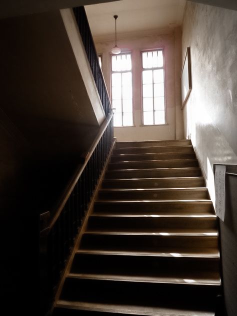 an empty staircase leading up to the second floor