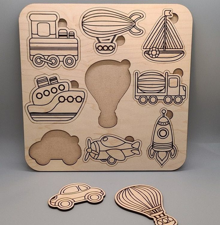 a wooden puzzle with different shapes and sizes