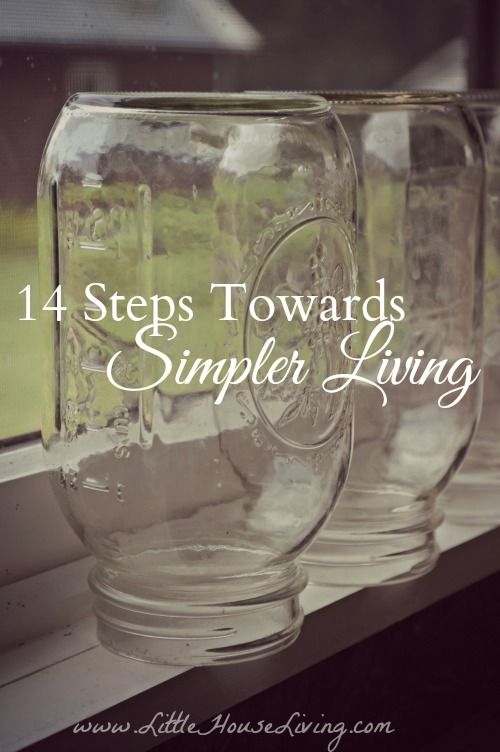 four glass jars sitting on top of a window sill with the words 4 steps towards simple living