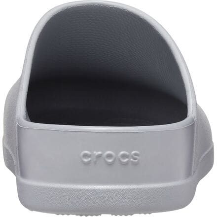 The Dylan Clog melds the classic styling of mules with the unbelievable comfort of Crocs' classic Croslite material. The soft cushioning of the footbed keeps our feet fresh for long walks along the boardwalk or hours of chores around the house and backyard. The easy slip-on style stays next to the door so we can slide them on as we head out of the house, but there's no guarantee we'll want to take them off when we get back home. Comfortable Slip-resistant Clogs For Beach, Casual Closed Toe Non-slip Slides, Casual Non-slip Closed Toe Slides, Comfortable Synthetic Clogs With Rubber Sole, Classic Synthetic Slides With Cushioned Footbed, Non-slip Solid Synthetic Slippers, Non-slip Synthetic Slippers, Comfortable Non-slip Closed Toe Slides, Casual Slides With Removable Insole