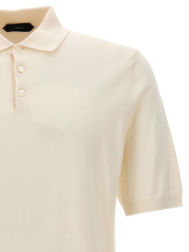 Cotton polo shirt with short sleeves. Composition: 100% cotton Polo Shirt White, Blazer Vest, Cotton Polo Shirt, Engineered Garments, Cotton Polo, T-shirt Polos, Blouse Dress, Lace Boots, Sweatshirt Shirt