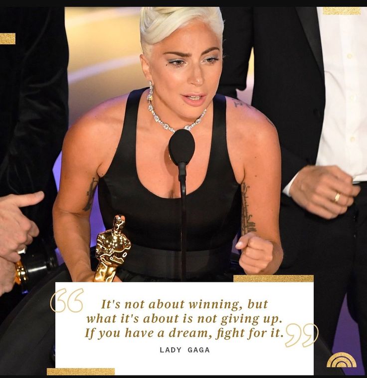 lady in black dress holding up an award for her work on the film, it's not about winning, but what it's about its not giving up if you have a dream, light for it