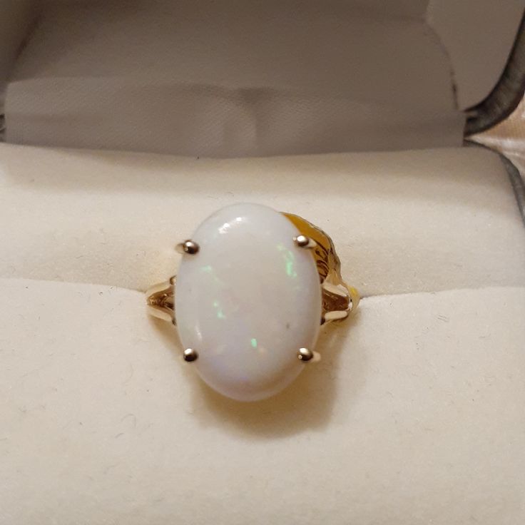 10k Australian Opal Oval Four Prong Opened Gallery Ring 4.5 Ring Size New With Tags Smoke And Pet Free Home Timeless White 14k Gold Jewelry, Timeless White Gemstone Jewelry, Classic Oval Opal Jewelry, Timeless White Jewelry With 17 Jewels, White Oval Opal Ring For Formal Occasions, Classic Oval White Ring, Heirloom 14k White Gold Jewelry, Classic White Opal Jewelry, Classic White Oval Ring